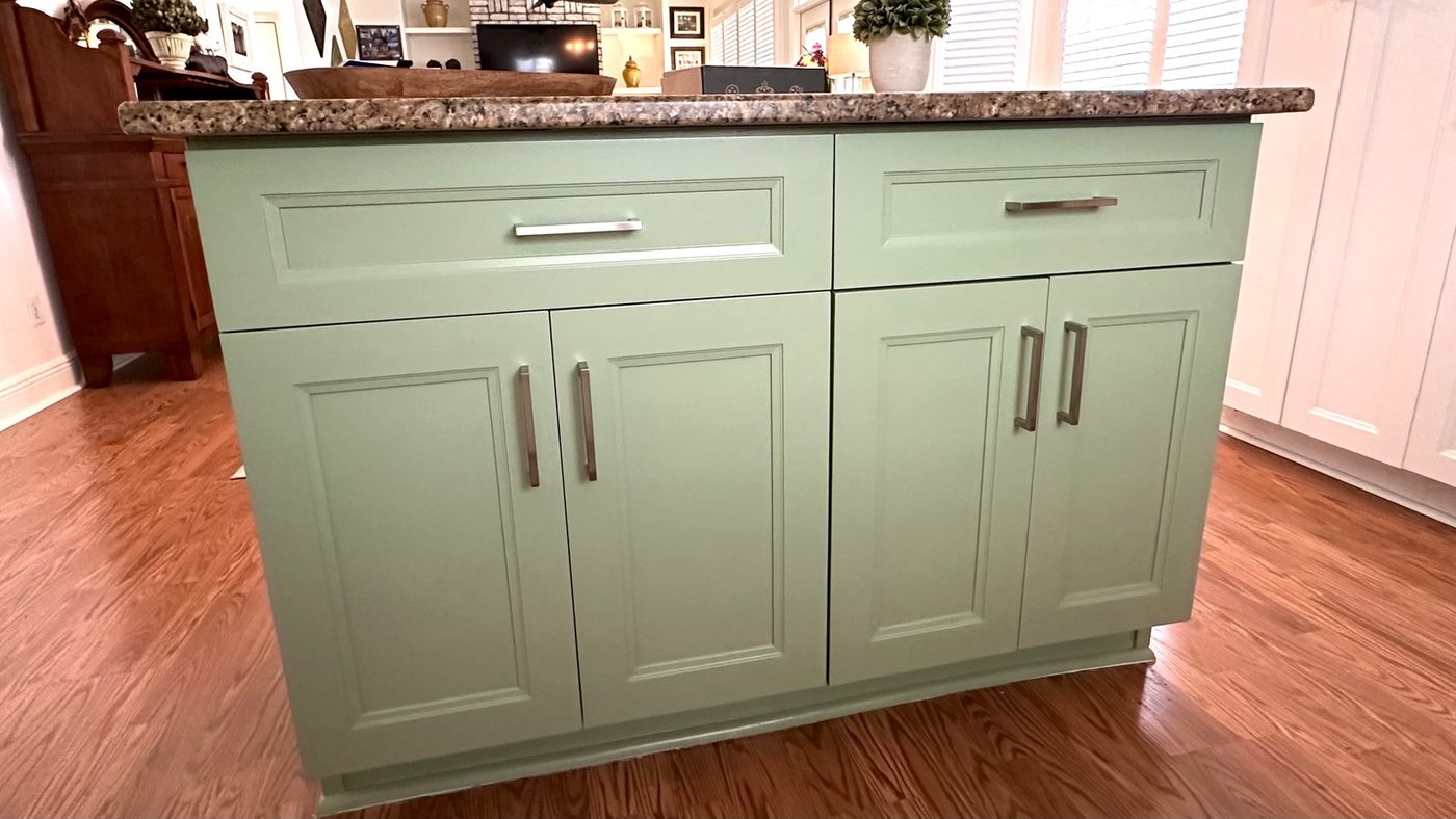 Green painted kitchen island