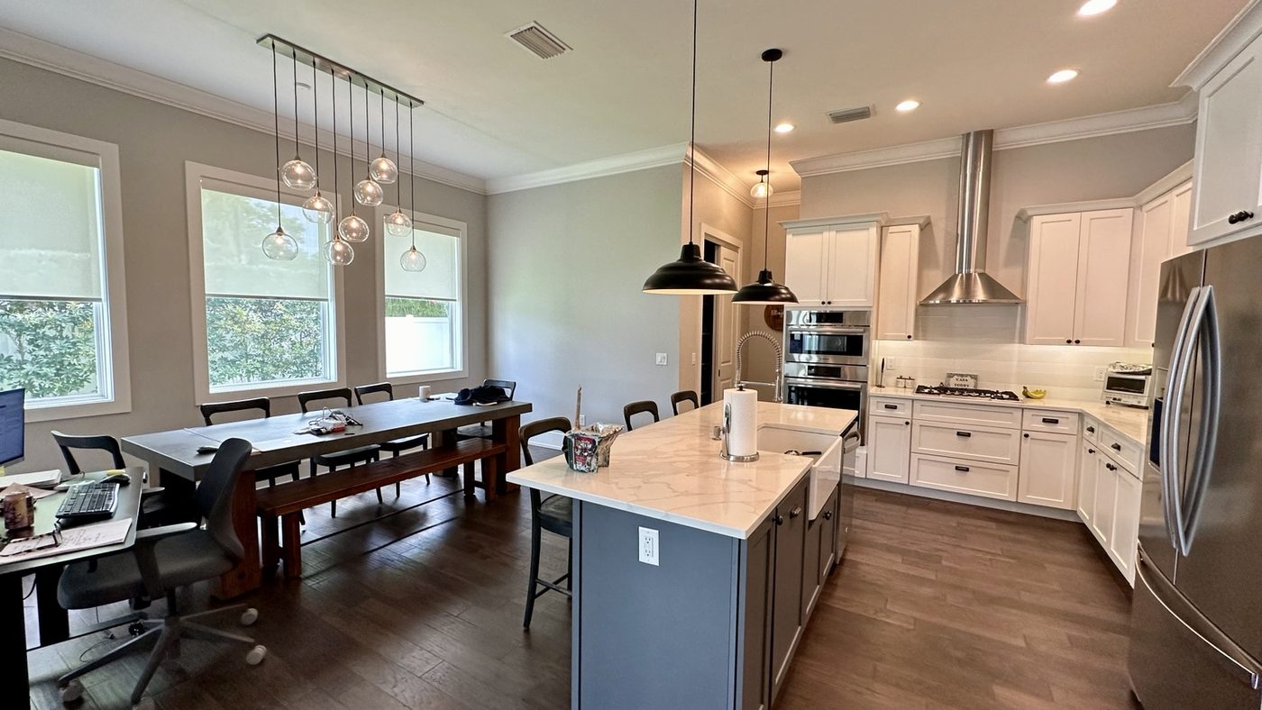 White kitchen with contrasting island