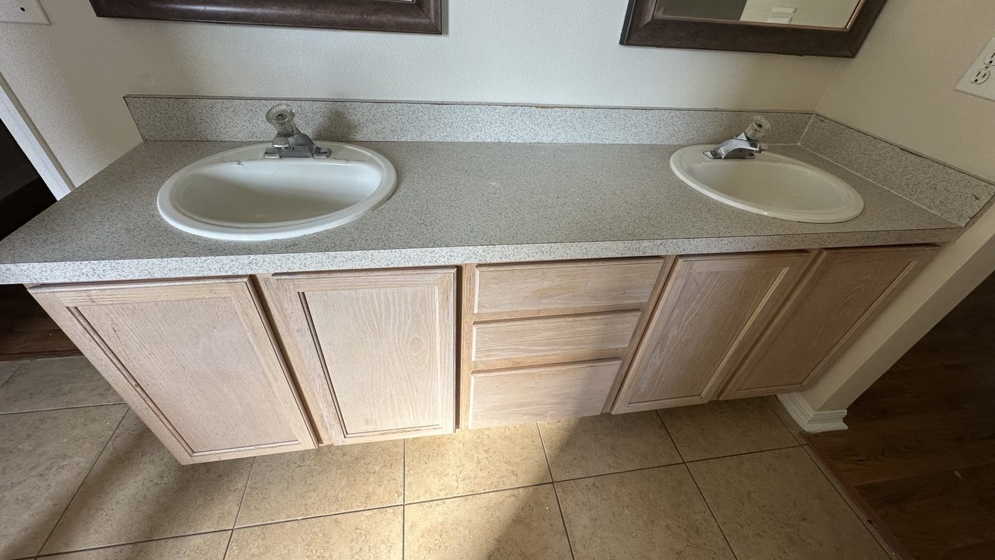 Double bathroom vanity before painting