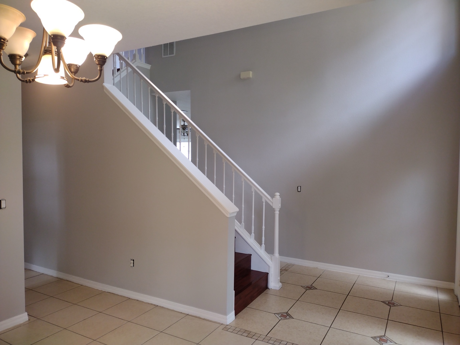 After interior painting transformation with light neutral walls
